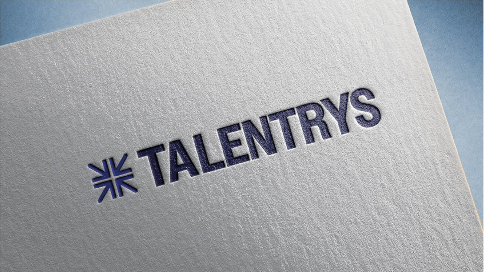 Logotype Talentrys embossé sur papier texturé.